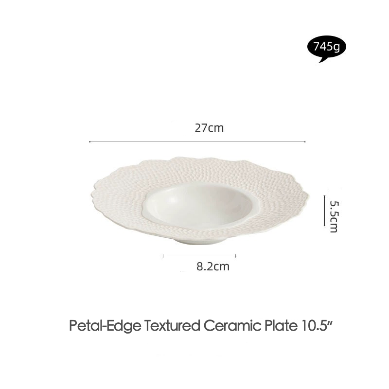 Hammered ceramic tableware with organic petal silhouette

