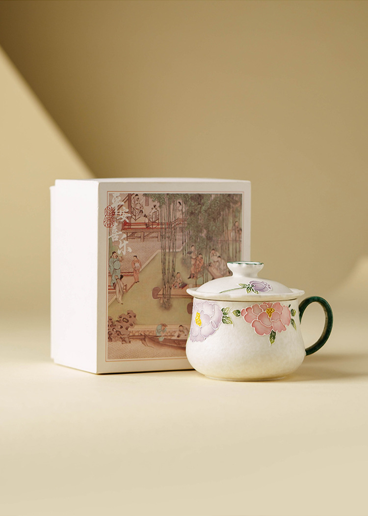 Hand-painted ceramic tea cup with soft floral design