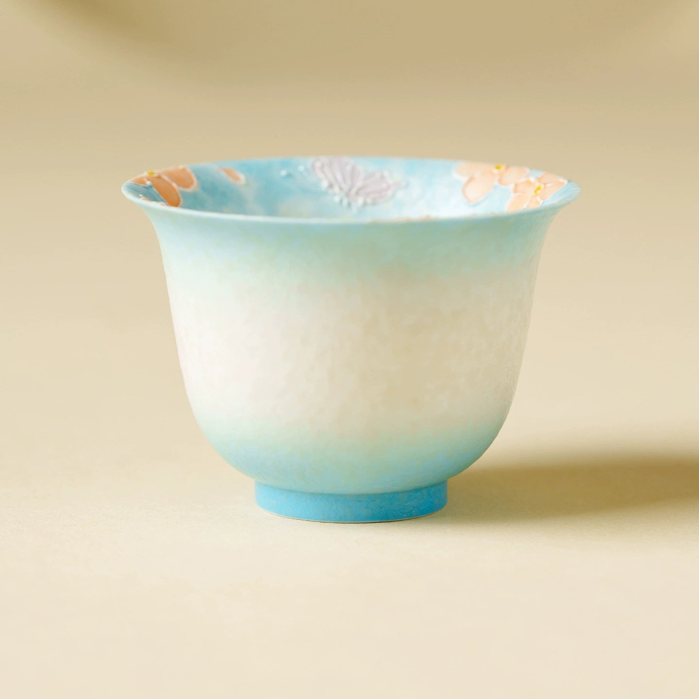 Hand-painted flared rim ceramic tea cup