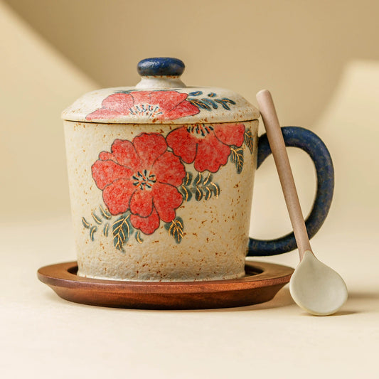 Hand-painted floral ceramic coffee mug with lid and saucer