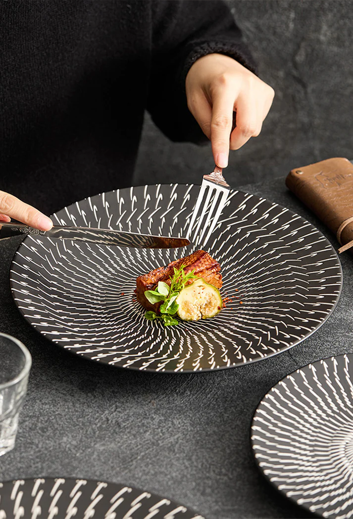 Hand-painted porcelain plate showcasing refined craftsmanship