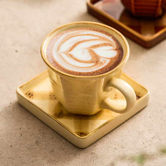 Hand-painted vintage ceramic coffee mug with square saucer