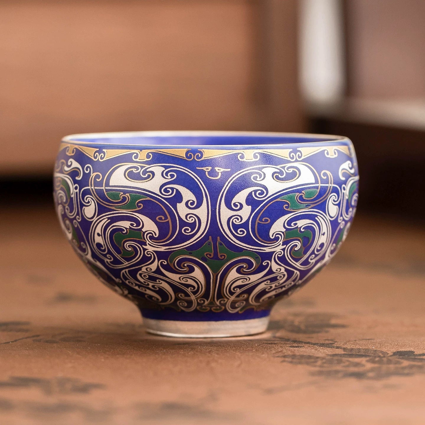 Handcrafted blue porcelain master cup with silver filigree design