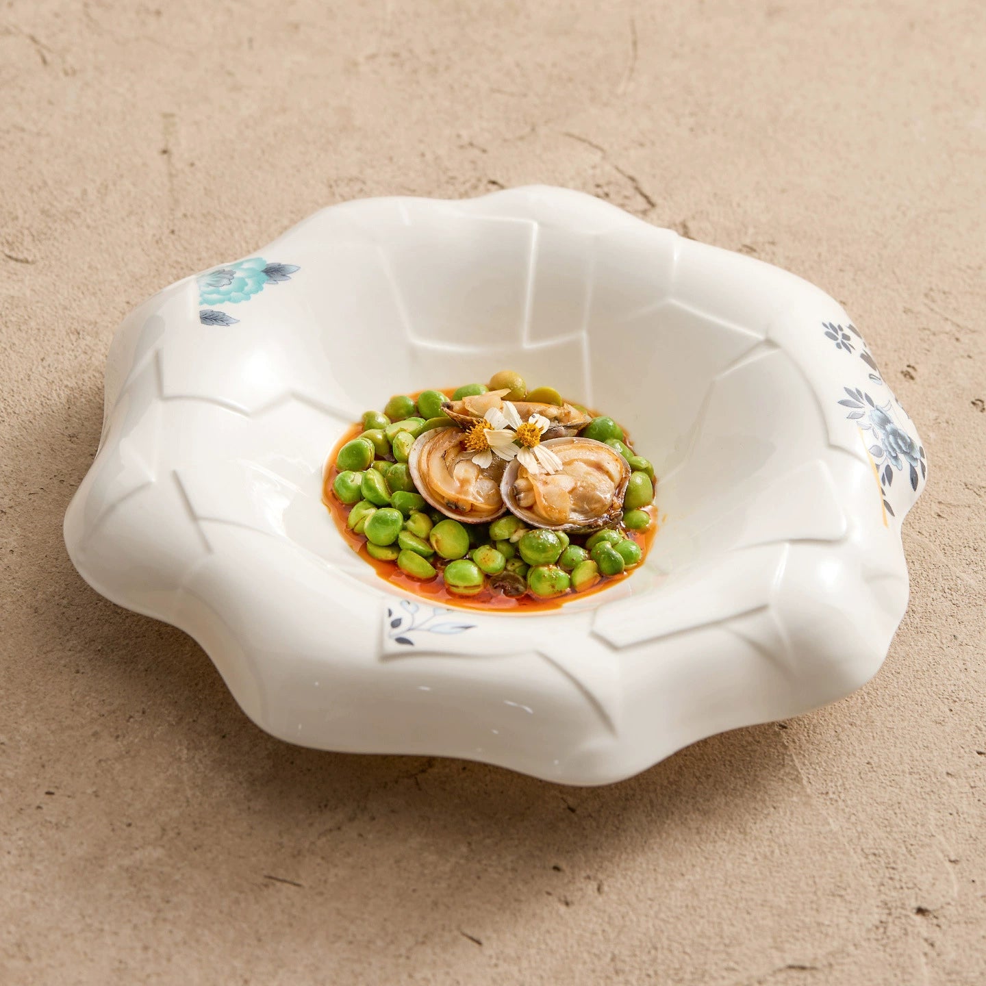 Handcrafted ceramic bowl inspired by blooming floral forms.