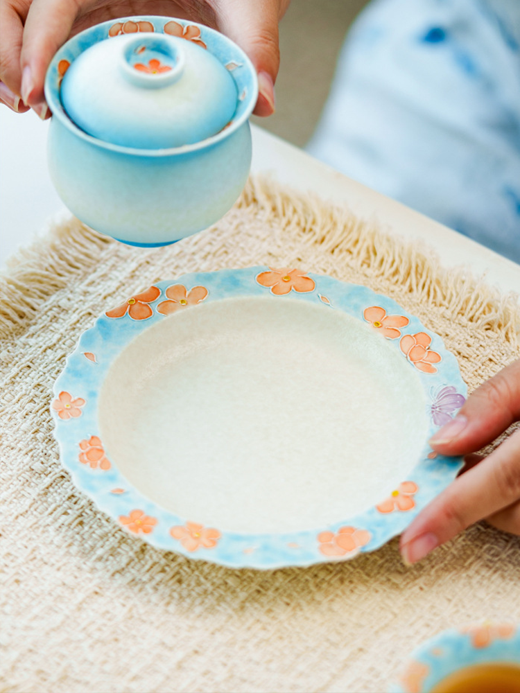 Handcrafted ceramic plate ideal for table styling