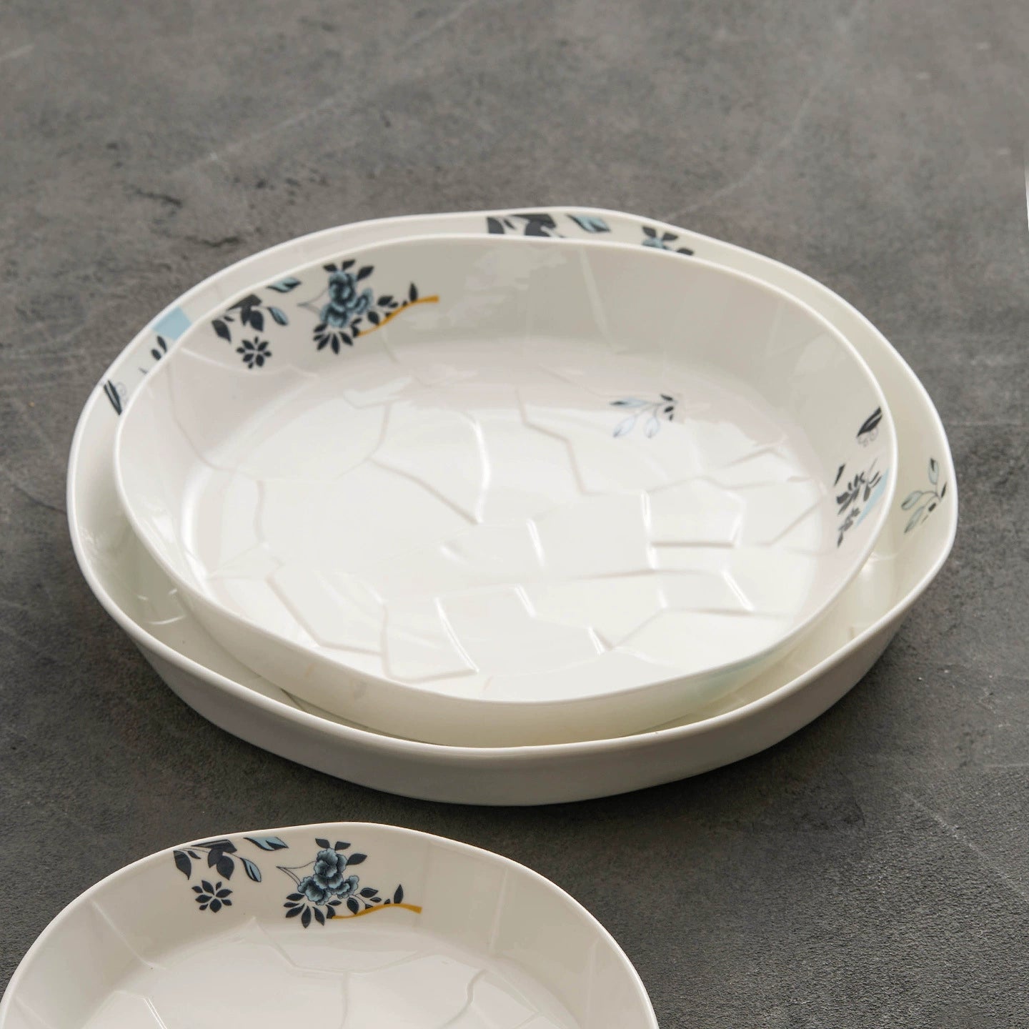 Handcrafted porcelain soup plate with natural cracked pattern.