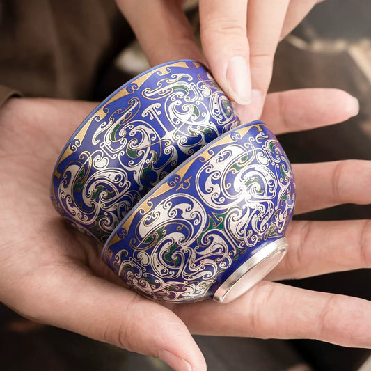 Handcrafted porcelain tea cup with 999 silver filigree detailing
