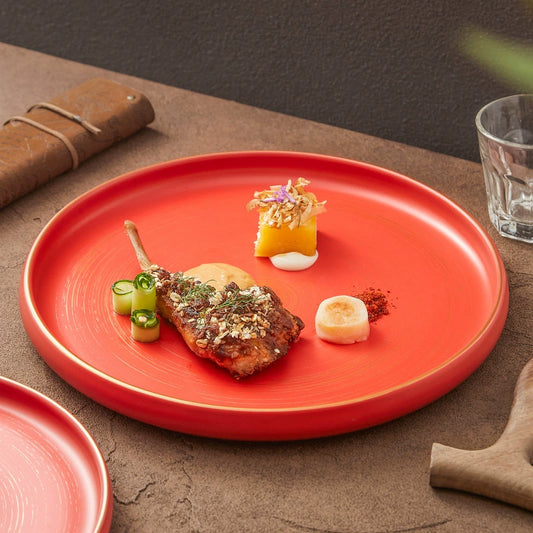 Handcrafted round plate ideal for artistic food presentation

