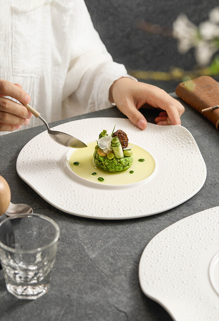 Handmade-style sculptural dinnerware