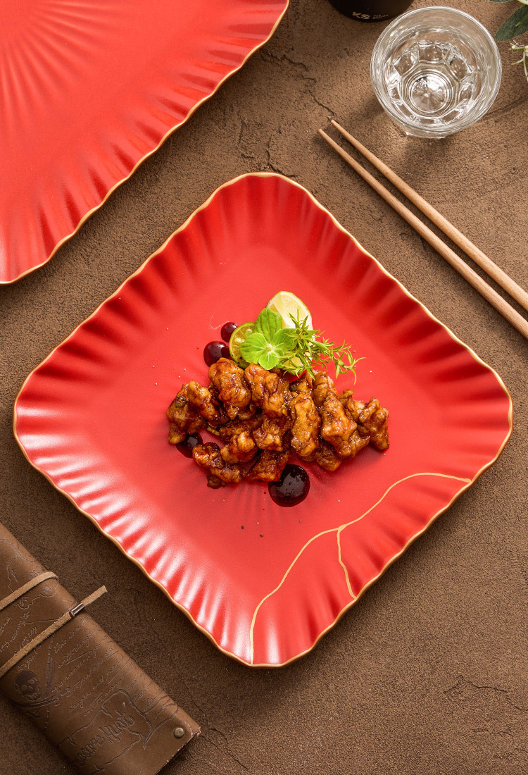 Handmade Kintsugi-inspired red dish