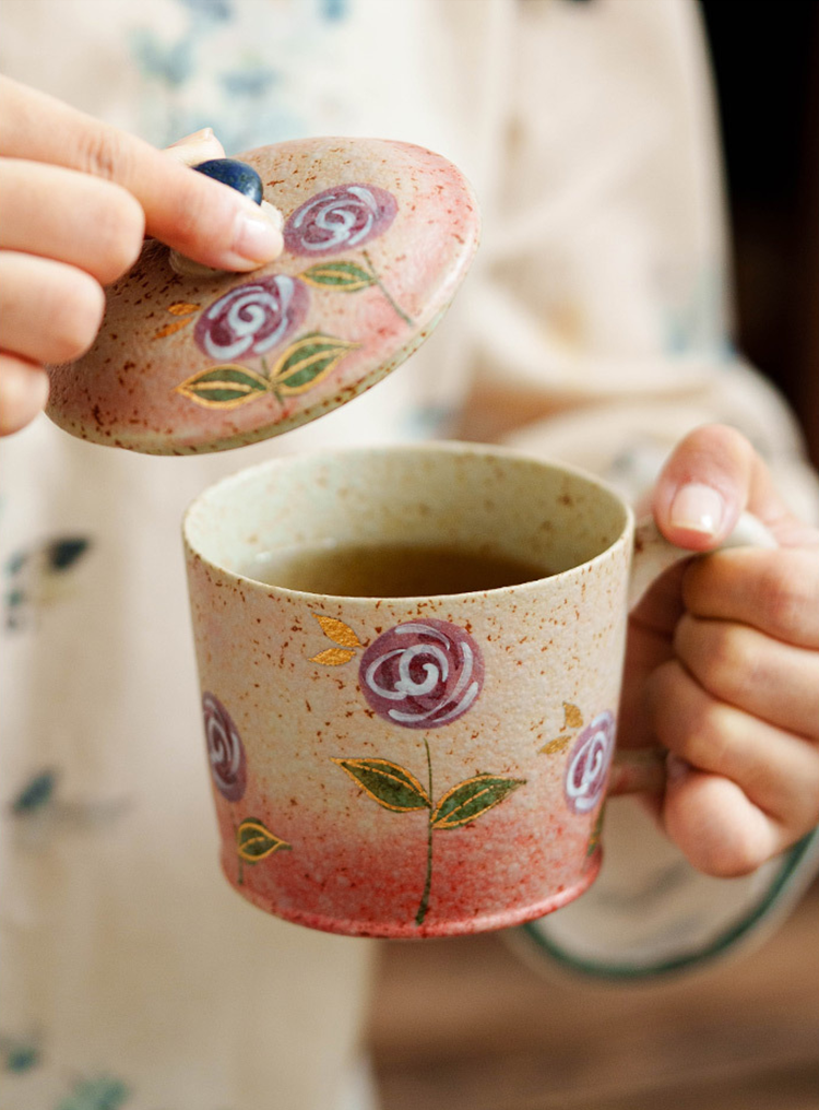 Handmade ceramic cup with natural glaze and walnut saucer