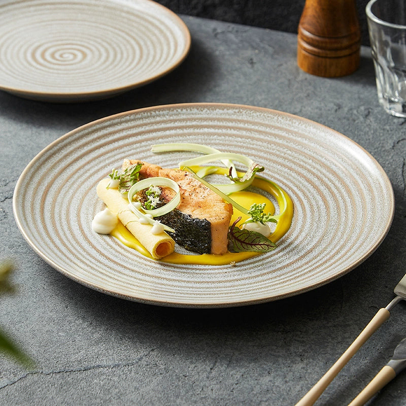 Handmade ceramic dish with ripple surface and modern Nordic design