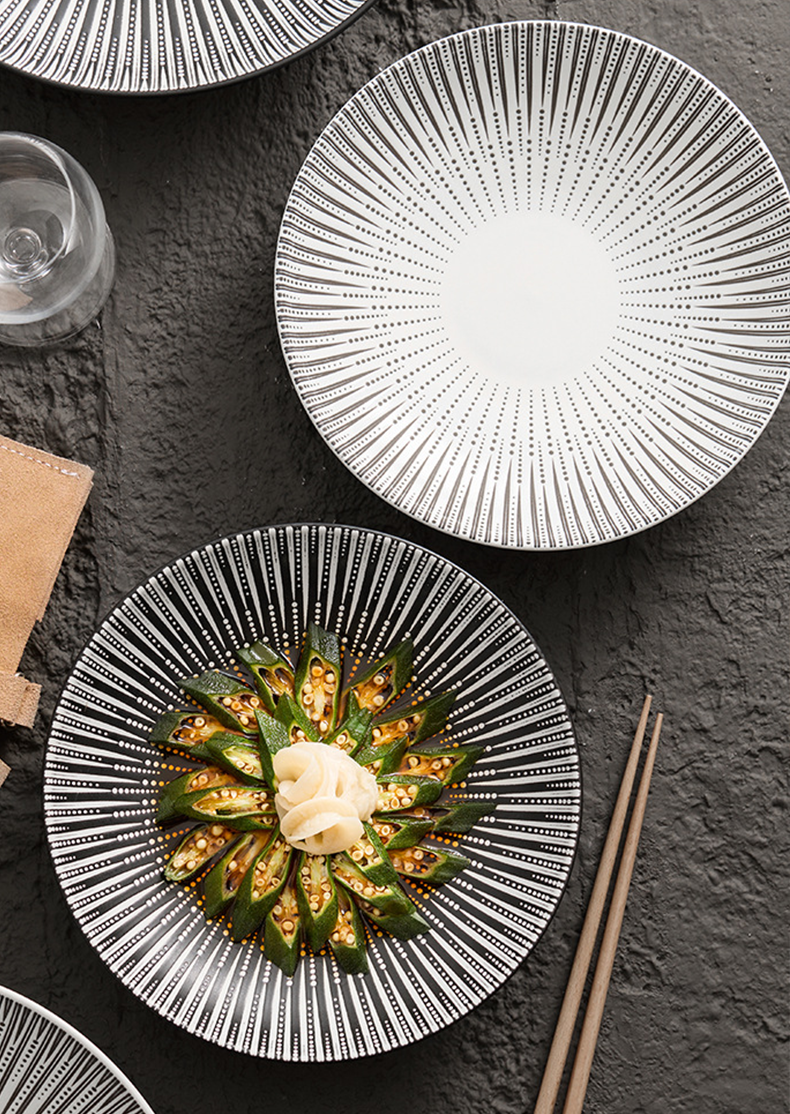 Handmade ceramic plate with artistic radial pattern design