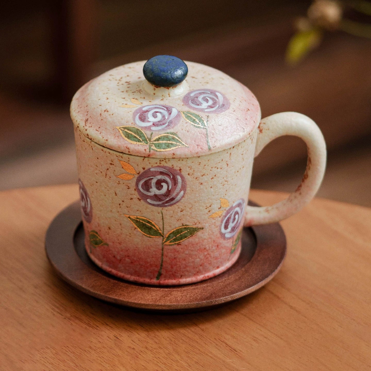 Handmade ceramic tea mug with lavender flower design