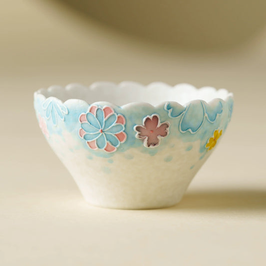Handmade ceramic teacup with floral design