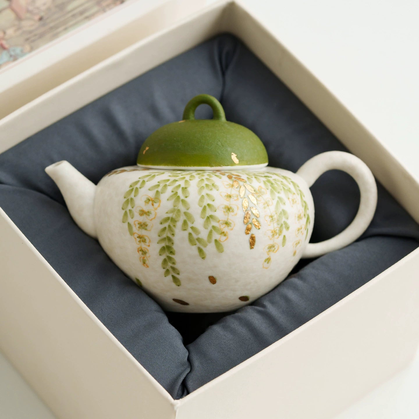 Handmade green lid ceramic teapot nature inspired