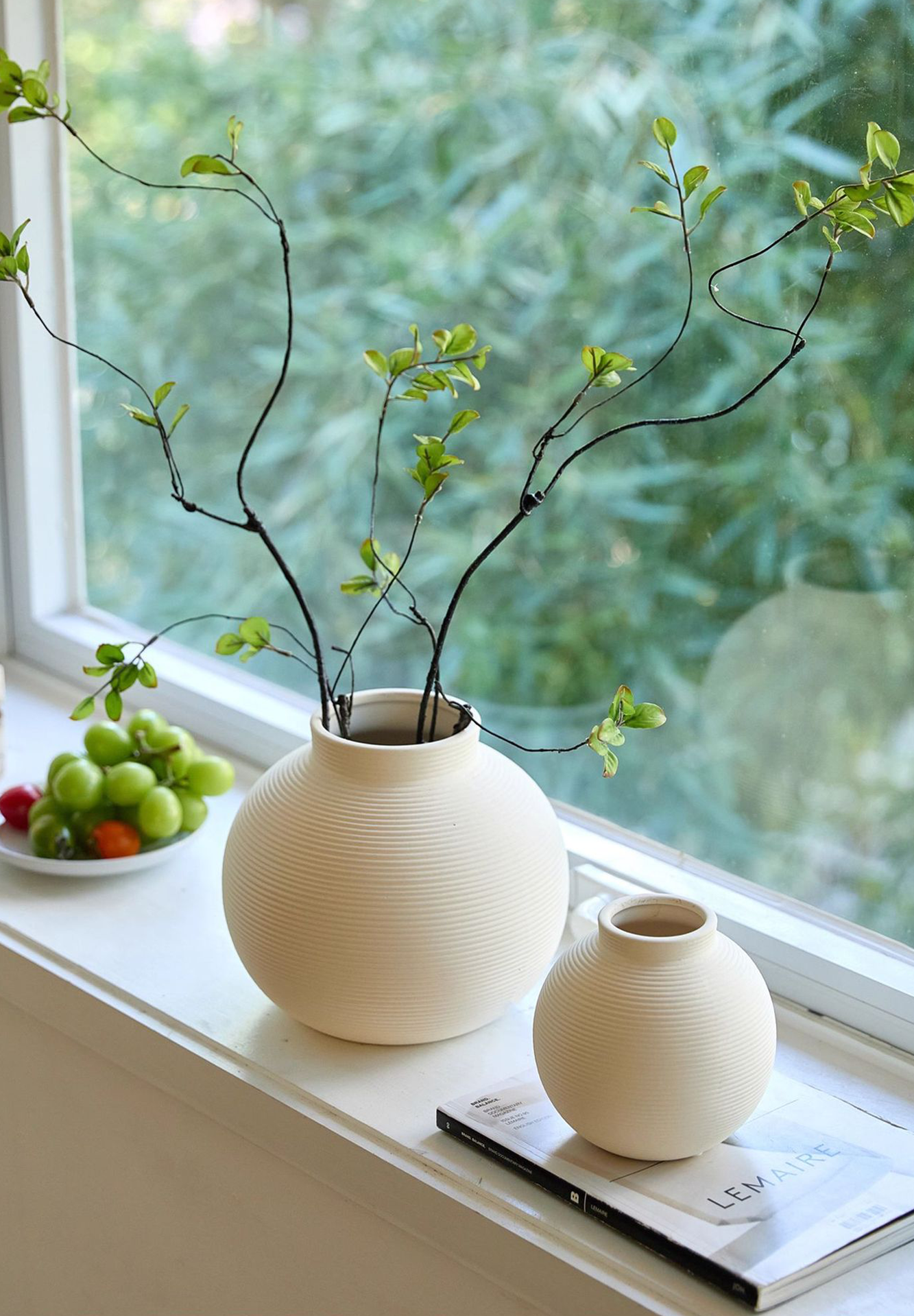 Handmade ribbed clay vase for dried flowers