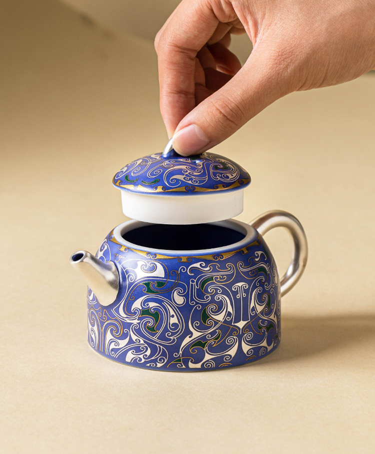 High-end Chinese teapot with 999 silver craftsmanship and blue glaze