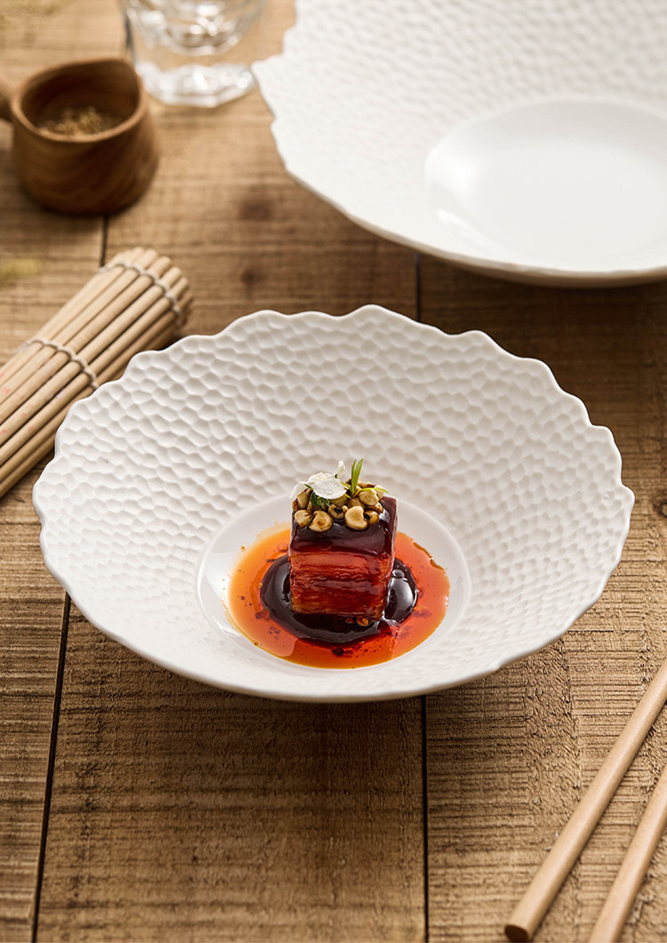 High-fired 760g serving bowl with organic lattice pattern and matte finish.