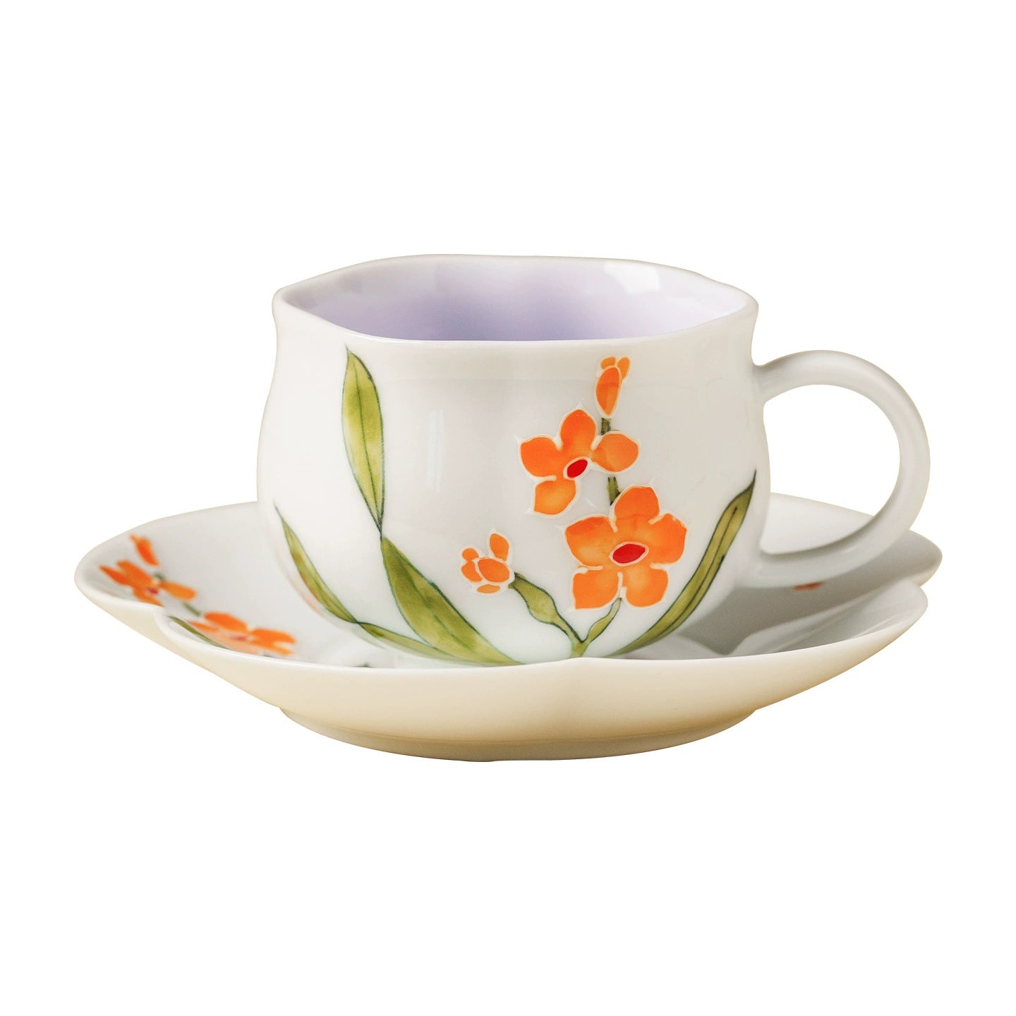 High-fired ceramic teacup and saucer with floral pattern