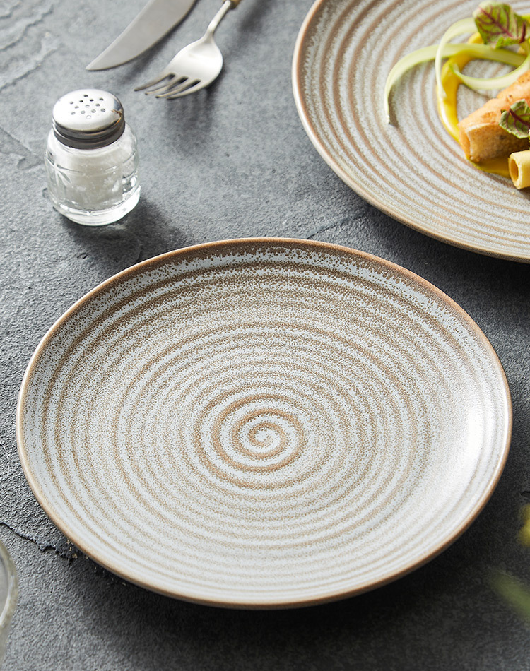 High-fired porcelain dinner plate with matte sand glaze finish