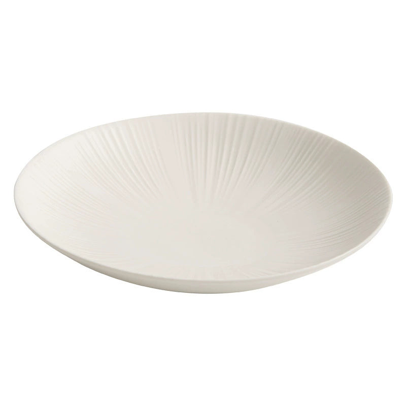High-temperature fired ceramic tableware with soft matte glaze.