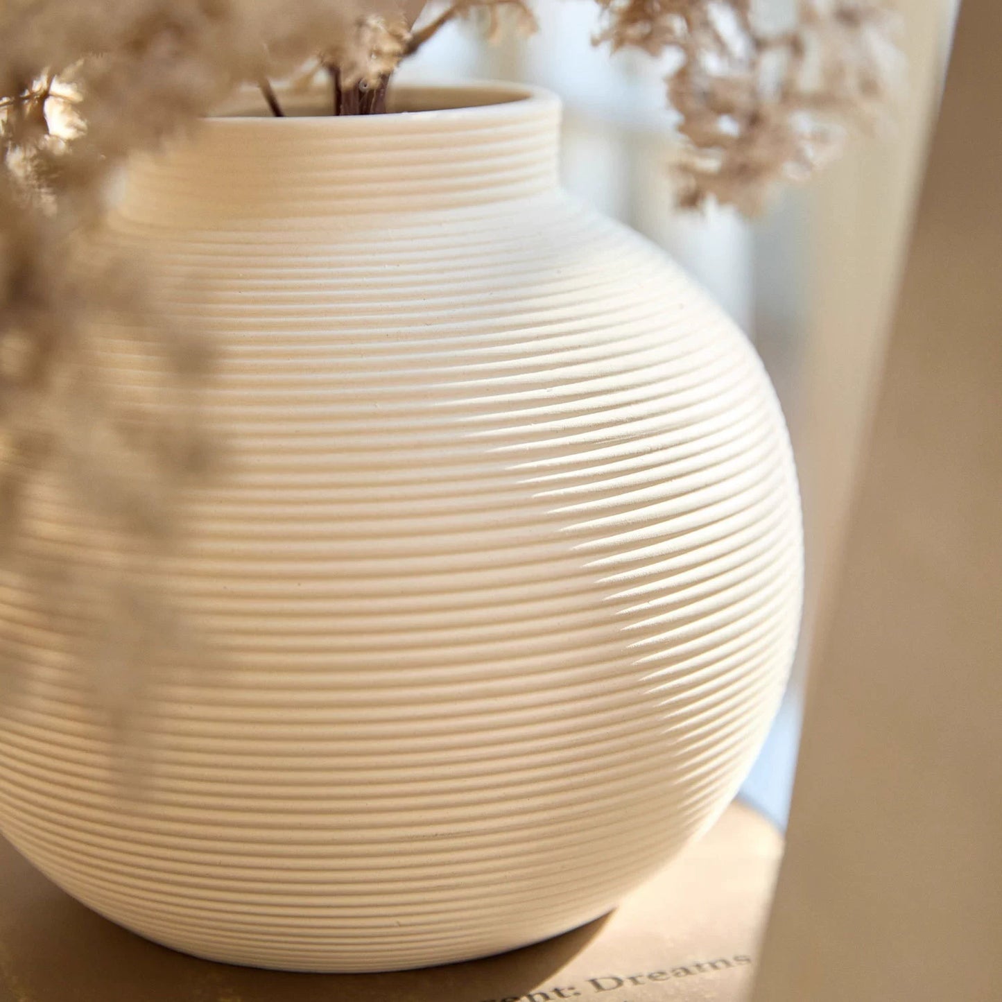 Japanese-style unglazed vase with textured lines