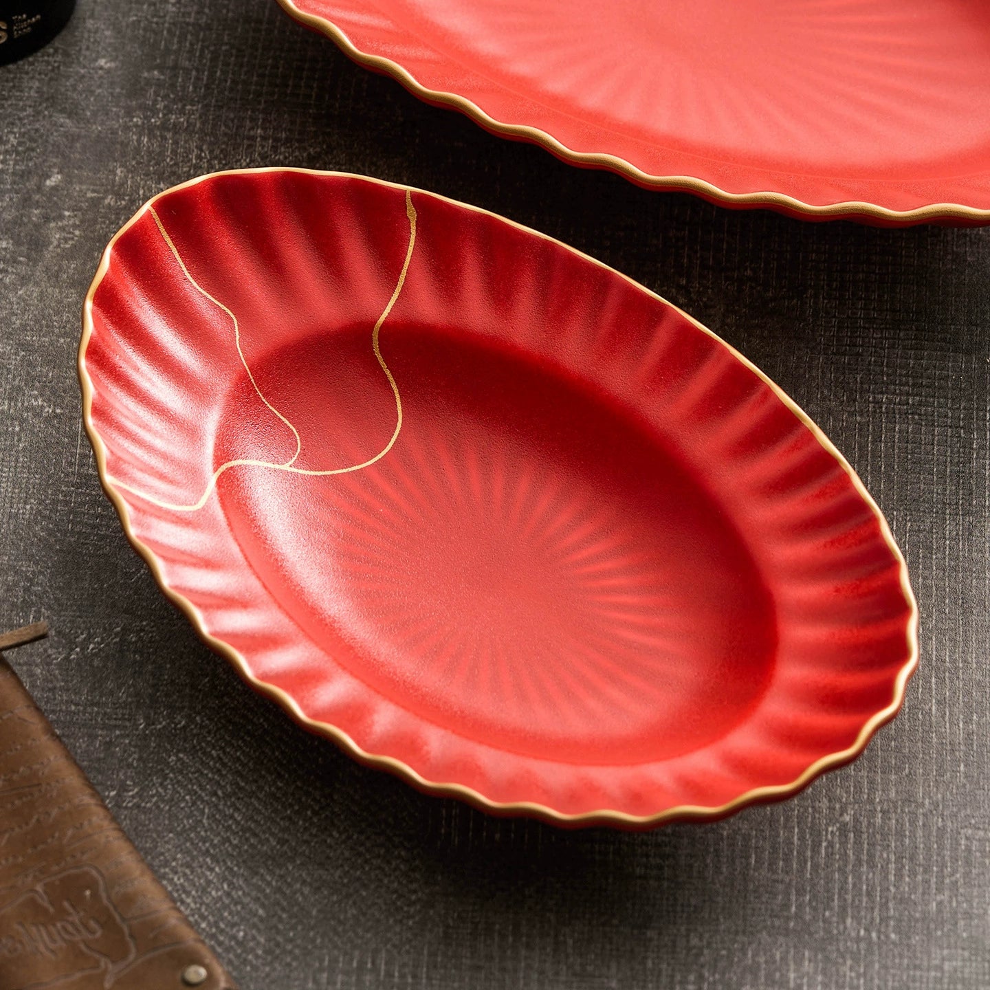 Kintsugi design red glazed dish