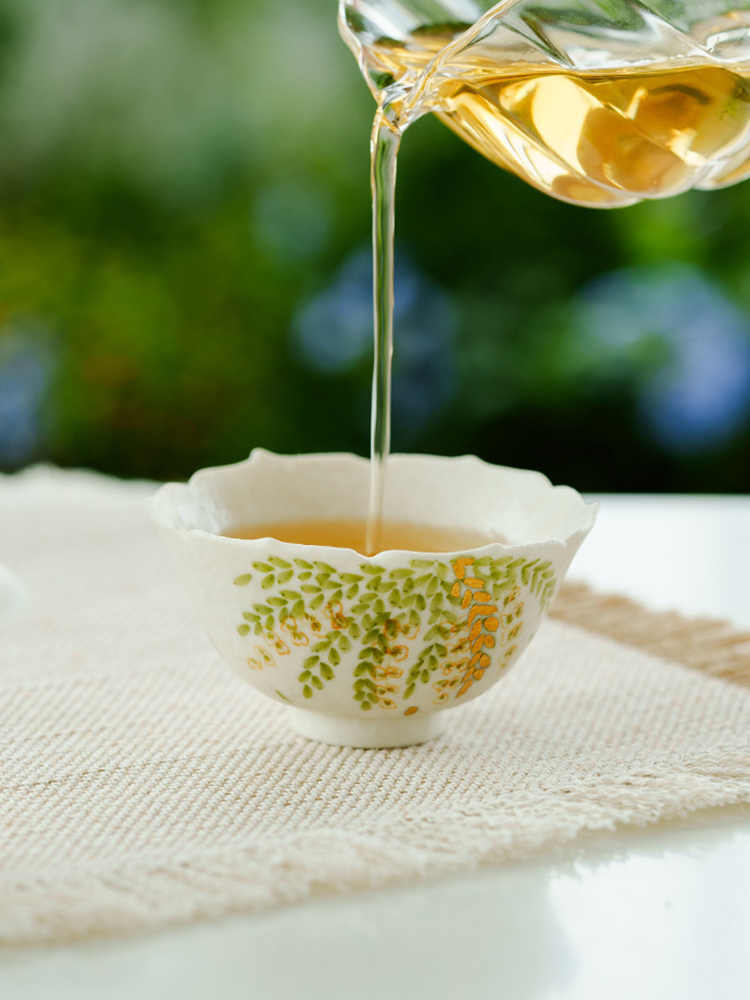 Lightweight 50g ceramic teacup with botanical design