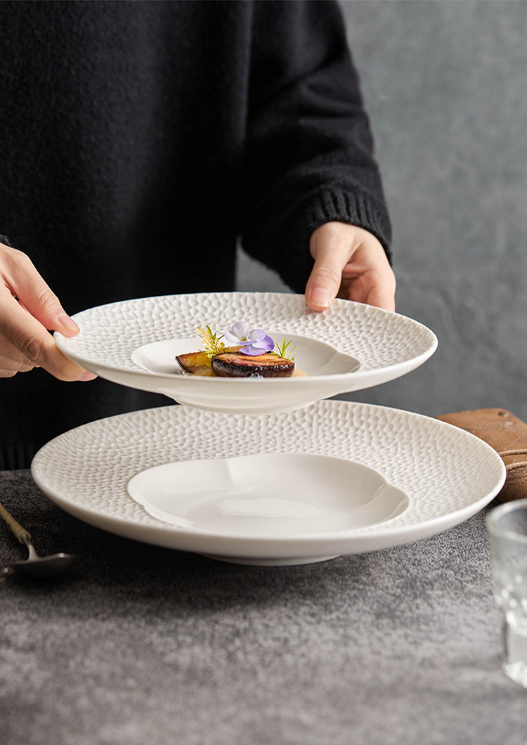 Luxury home hosting dinnerware representing the quiet perfection of form.