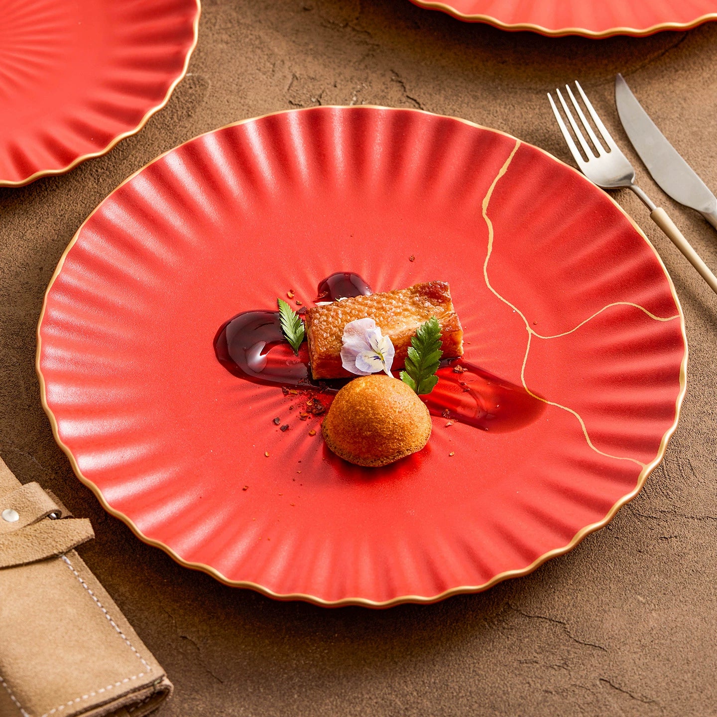 Red plate with a dessert on a brown surface