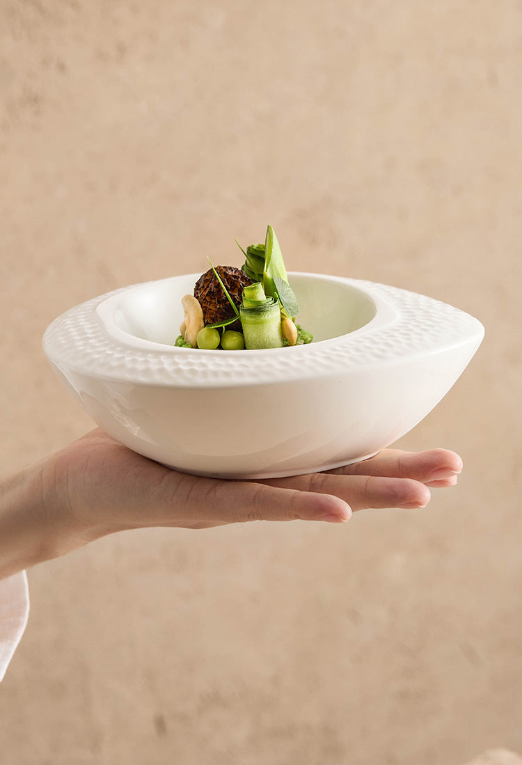 Minimalist ceramic hammered-edge bowl for home dining