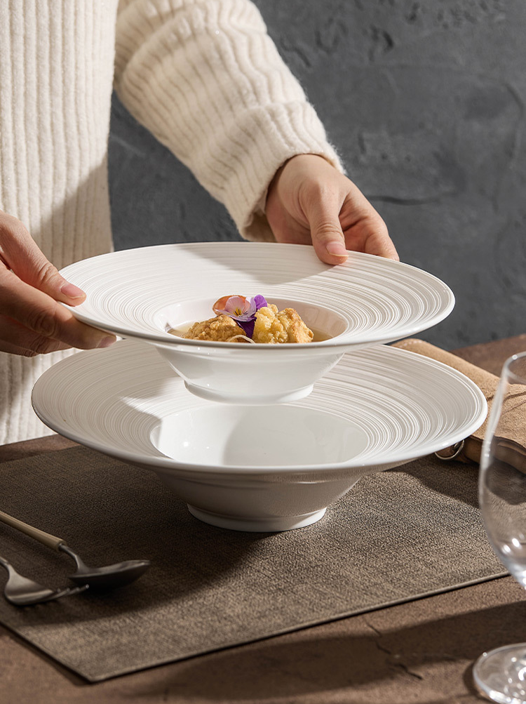 Minimalist ceramic plate used for gourmet plating