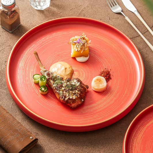 Minimalist ceramic plate with raised rim and subtle brush texture

