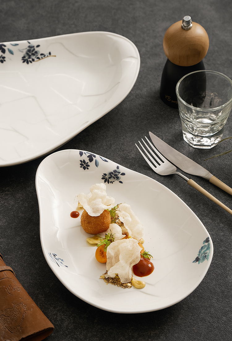 Minimalist ceramic serving dish with natural curvature.