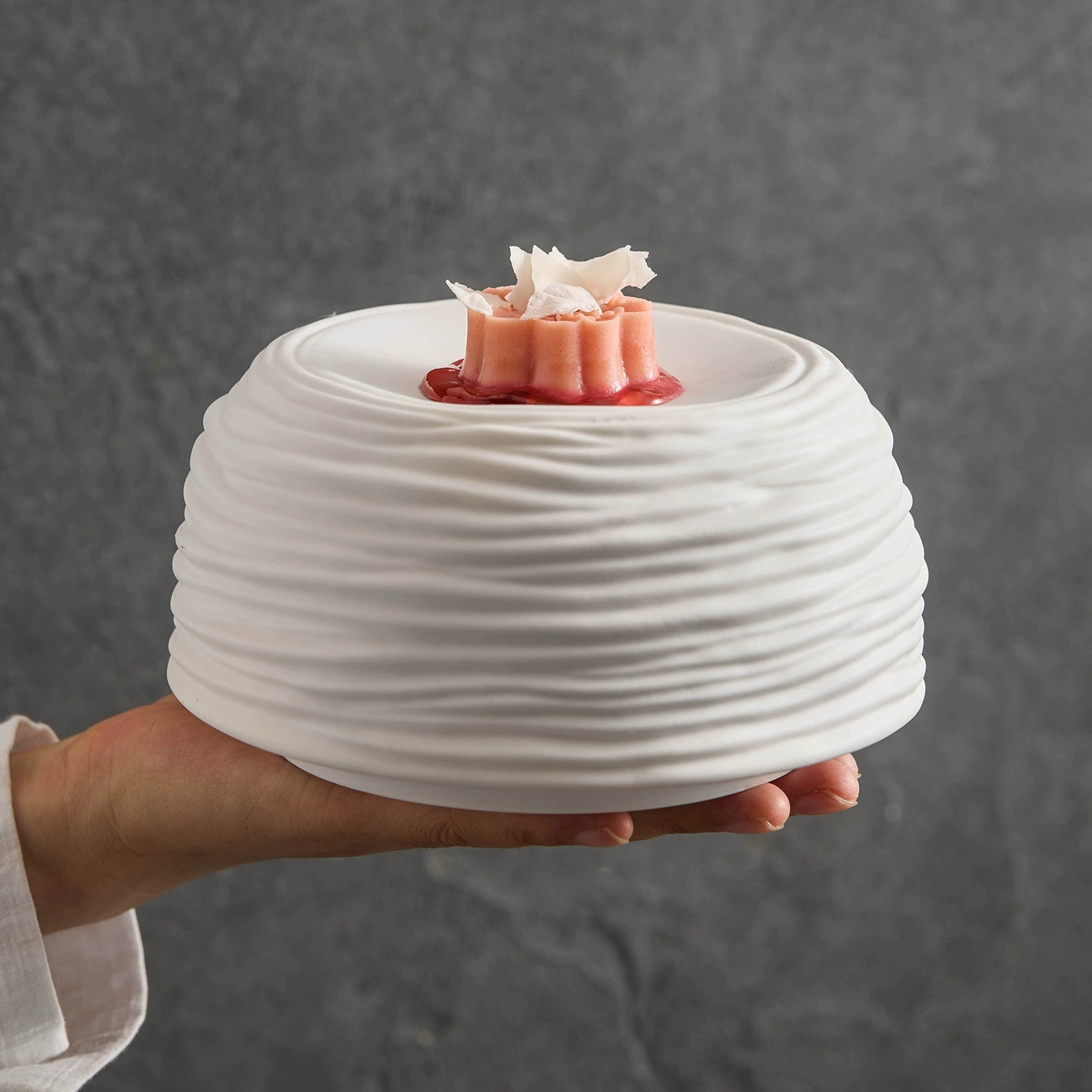 Minimalist ceramic serving dish with ripple texture