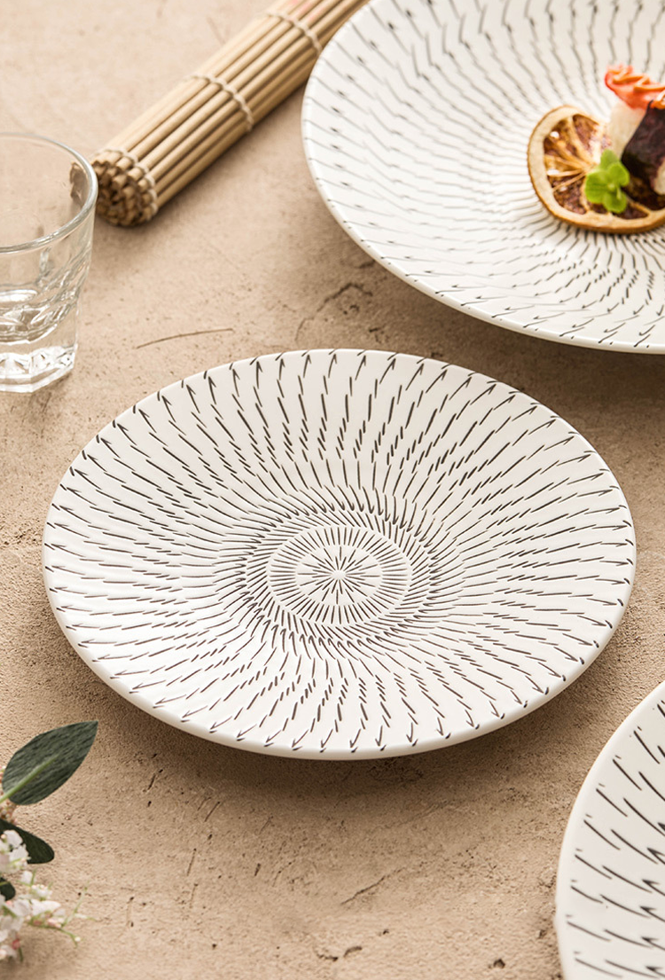 Minimalist ceramic tableware highlighting Japanese aesthetic influences