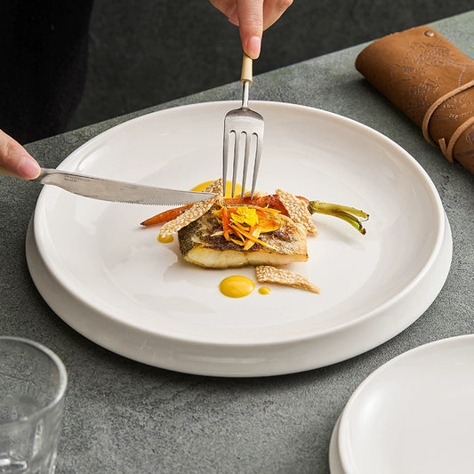 Minimalist fine porcelain deep plate in white