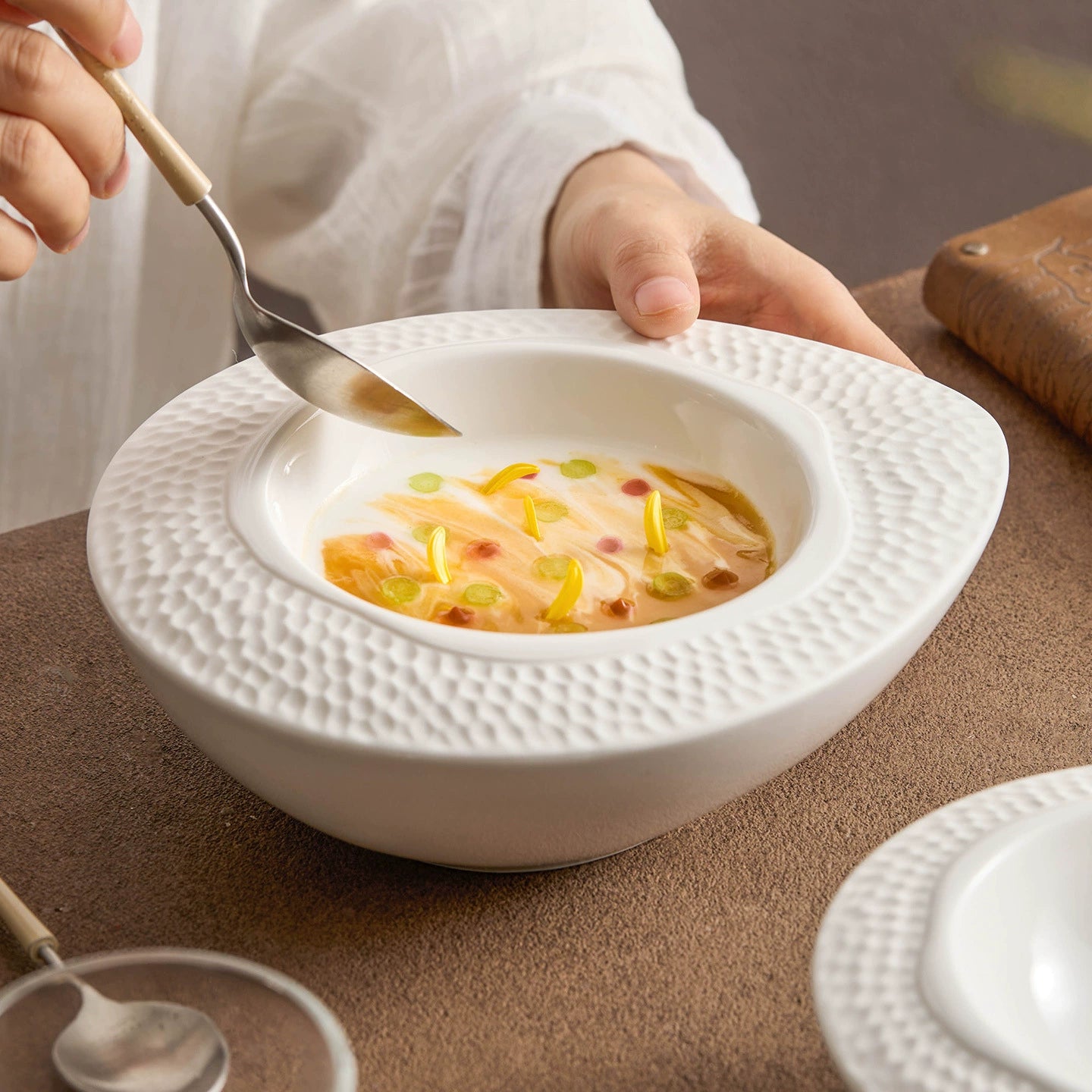 Minimalist hammered ceramic bowl for contemporary table settings