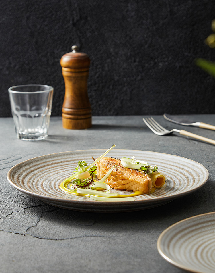Minimalist restaurant-style tableware featuring handcrafted swirl design