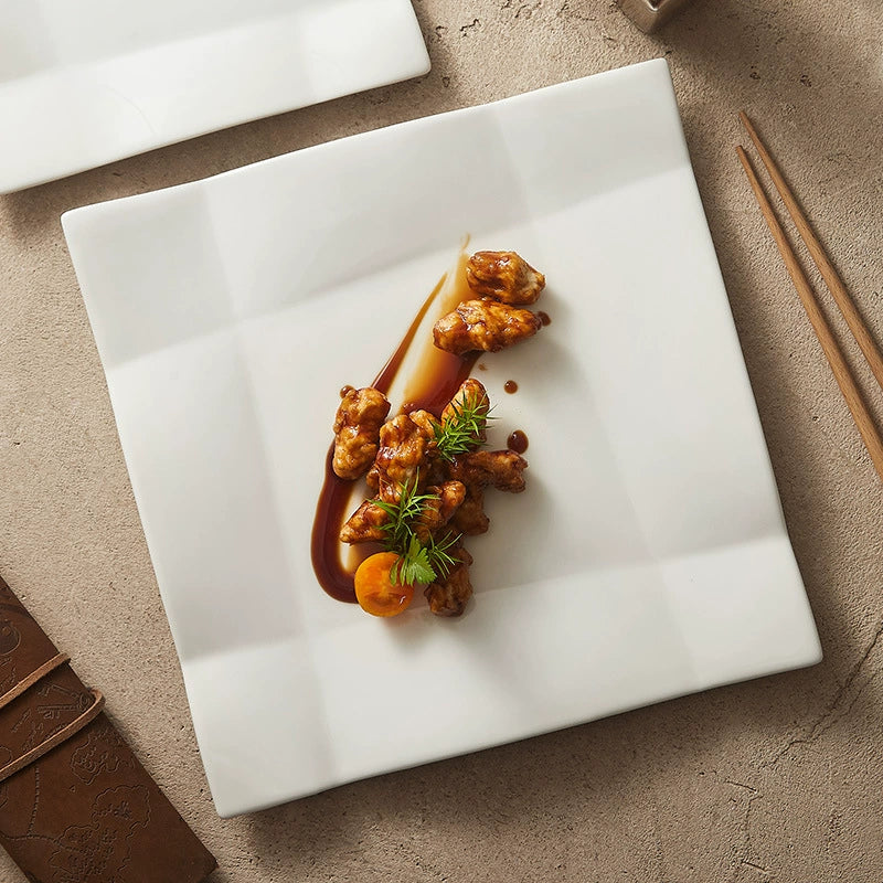 Minimalist square ceramic plate used for creative entrée plating