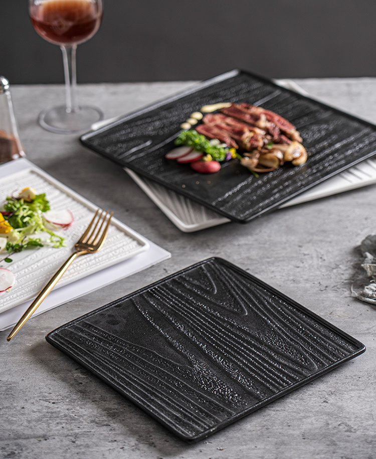 Minimalist square ceramic plate with refined surface detail