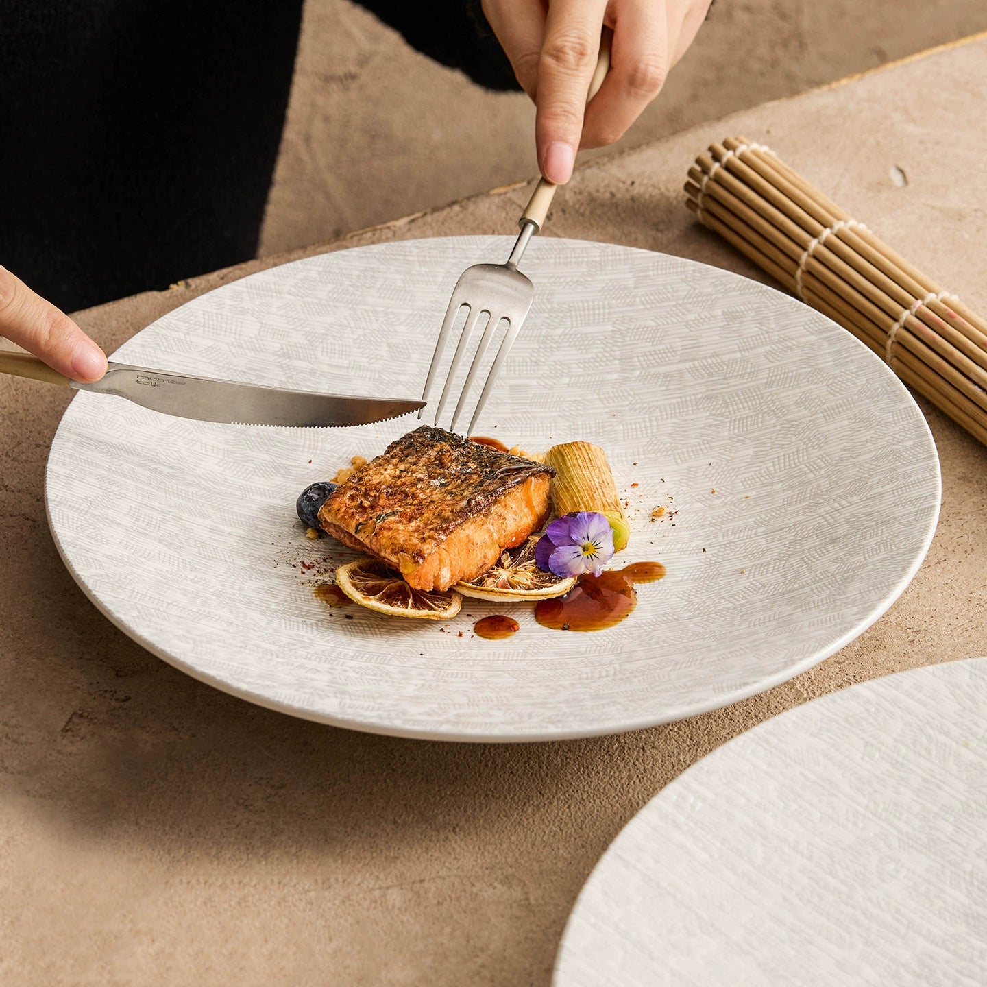 Minimalist striped plate ideal for seafood, pasta, and composed dishes