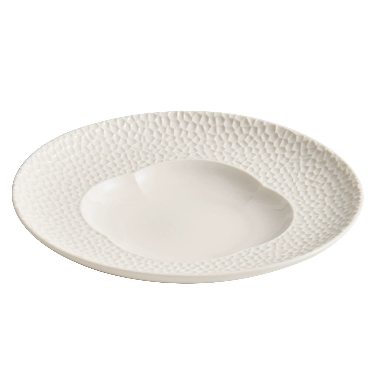 Minimalist table setting featuring a textured lattice-rimmed blossom plate.