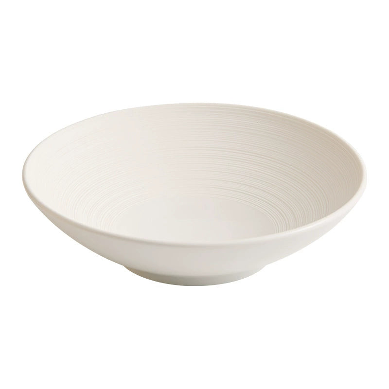 Minimalist wide-rim bowl used for refined cold dish presentation