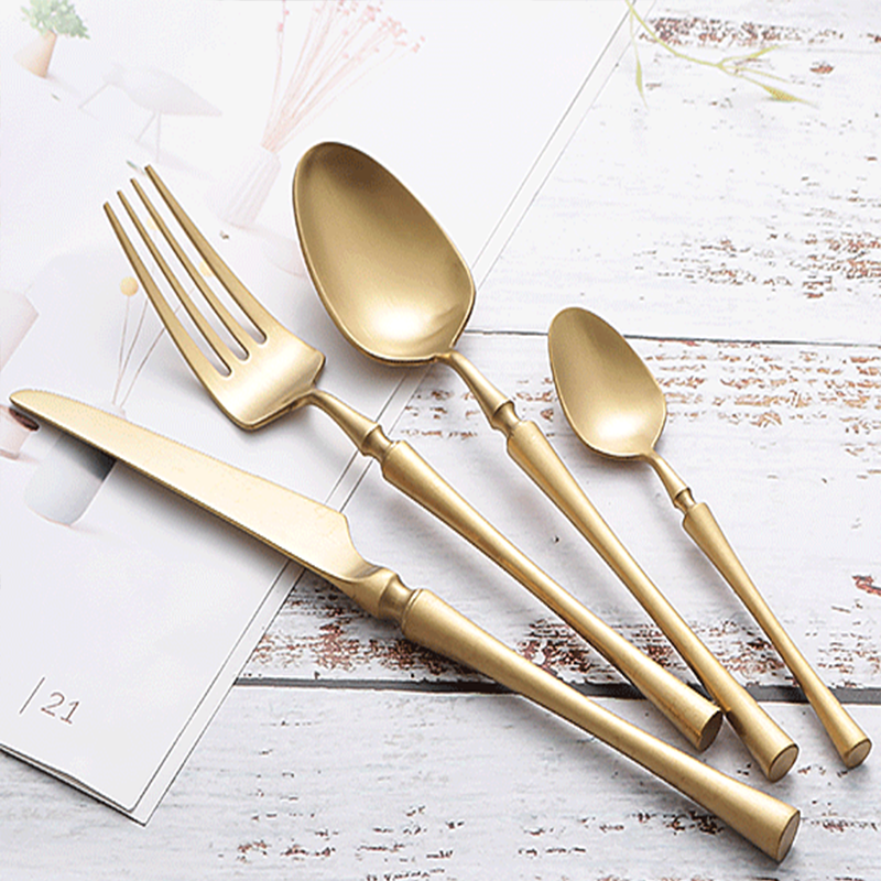 Minimalist stainless steel dinner fork with mirror polish