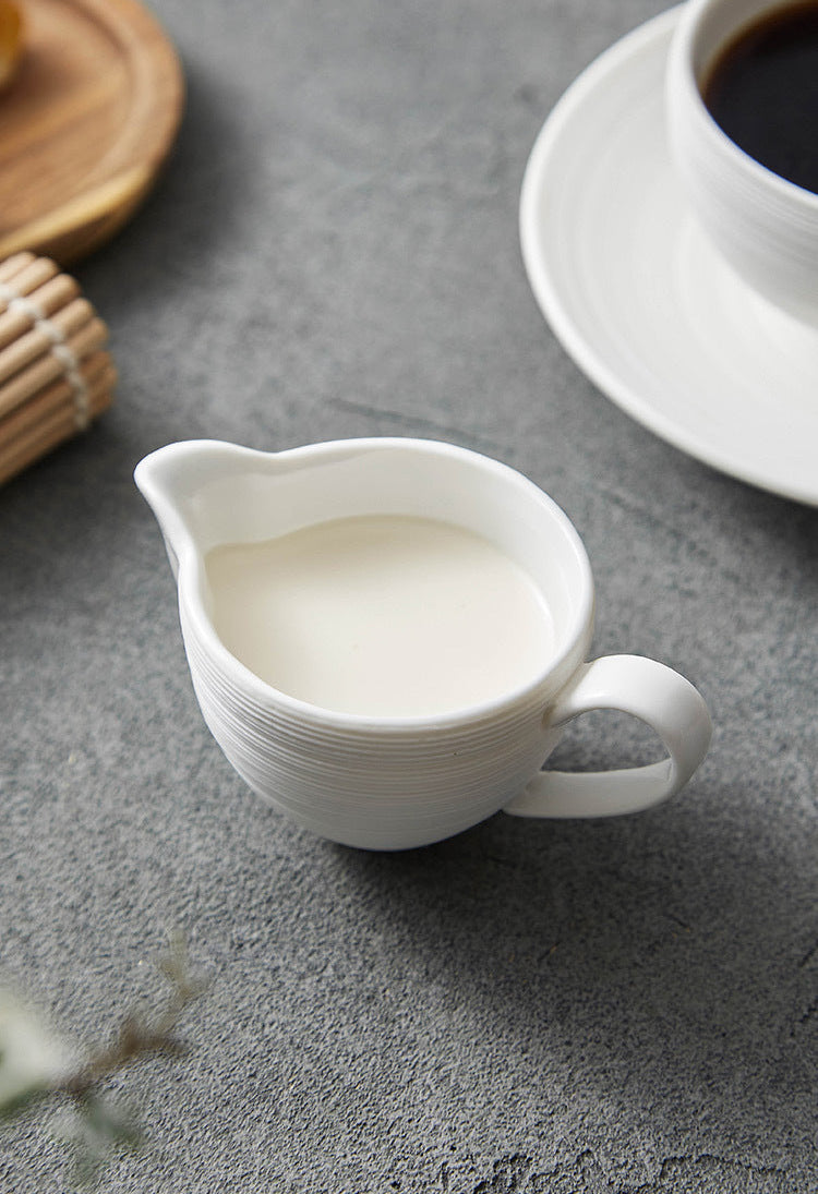 Modern ceramic milk server with handcrafted detail


