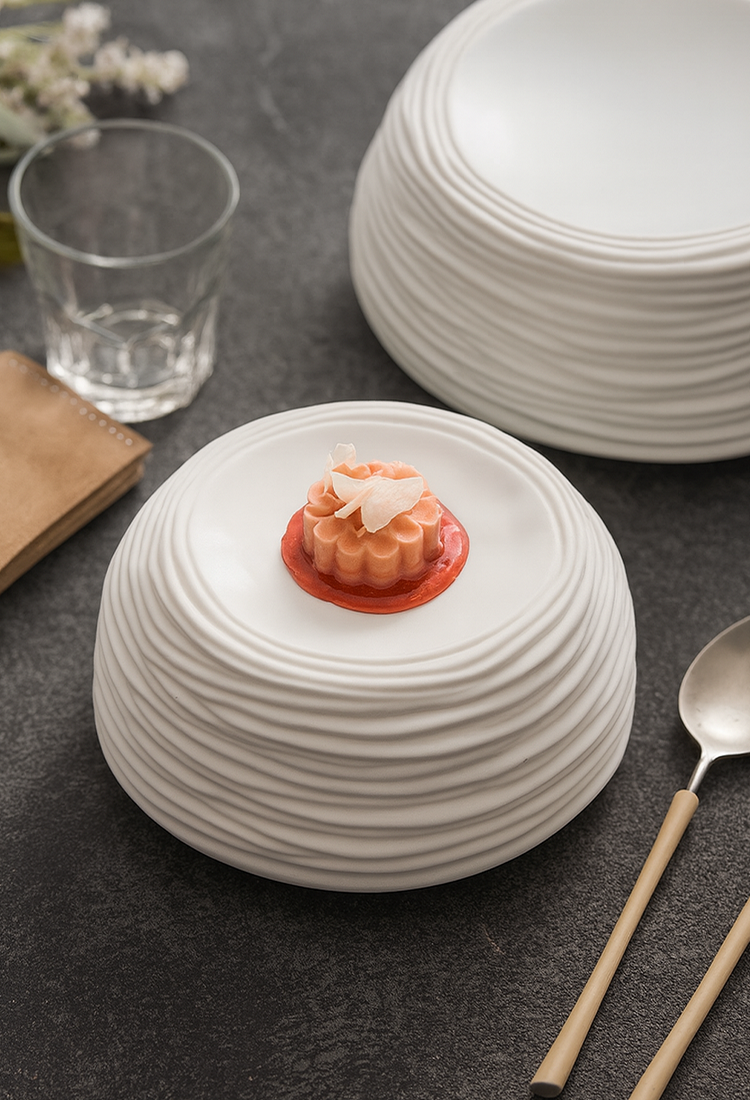 Modern ceramic plate with wave-like carved texture