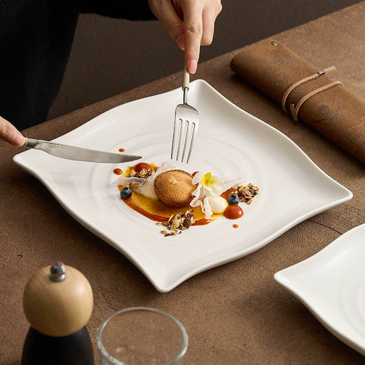 Modern concentric ripple square ceramic plate on dining table