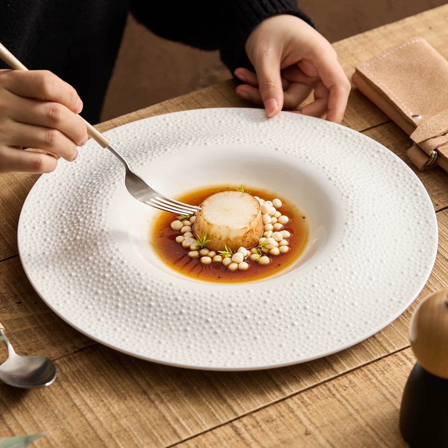 Modern minimalist 31.3cm ceramic service dish with deep center well.